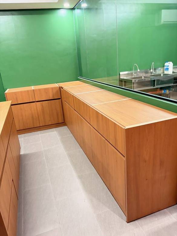 Timber island counter and perimeter runs with a glass display front